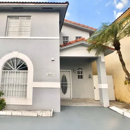 Rent this 3 bed townhouse on West 72nd Place in Hialeah, FL 33016