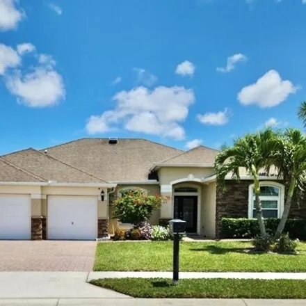 Buy this 4 bed house on 161 Grouper Circle Southeast in Palm Bay, FL 32909