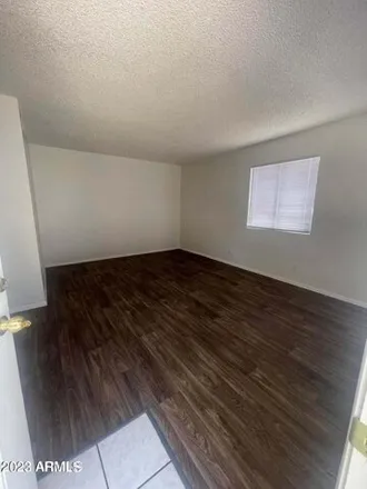 Rent this 2 bed apartment on 454 East 10th Avenue in Apache Junction, AZ 85119