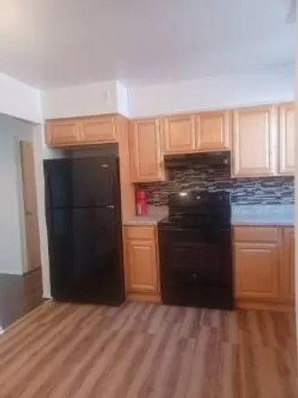 Rent this 3 bed duplex on 84-27 149th Avenue in New York, NY 11414