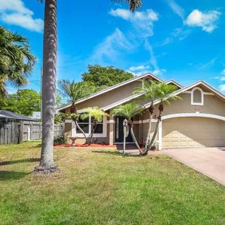 Buy this 3 bed house on 6051 Kendrick Street in North Palm Beach Heights, Jupiter