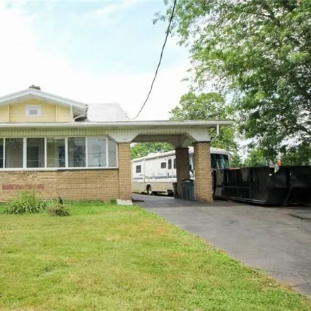 Buy this 4 bed house on 3901 Ravenna Ave in Louisville, Ohio