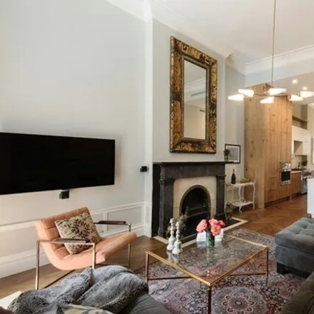 Rent this 4 bed townhouse on 13 East 9th Street in New York, NY 10003