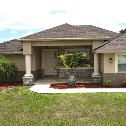 Buy this 3 bed house on 3349 Southwest Hill Street in Port Saint Lucie, FL 34953