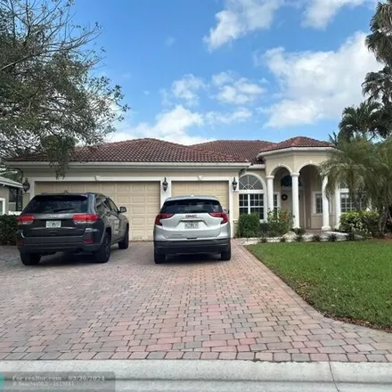 Buy this 4 bed house on 11837 Northwest 9th Street in Coral Springs, FL 33071