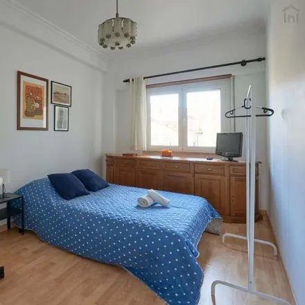 Rent this 3 bed room on Rua Luciano Freire in 1600-093 Lisbon, Portugal