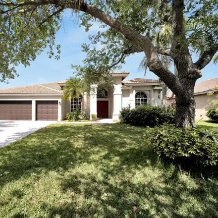 Buy this 5 bed house on 1348 Northwest 104th Drive in Coral Springs, FL 33071