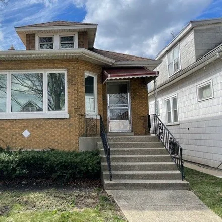 Buy this 3 bed house on 3006 North Marmora Avenue in Chicago, IL 60634