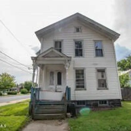 Buy this 4 bed house on 64 Spring Street in City of Gloversville, NY 12078