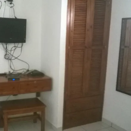 Buy this 22 bed apartment on Farmacias Especializados in Ciclovía Av. Tulum, Smz 5