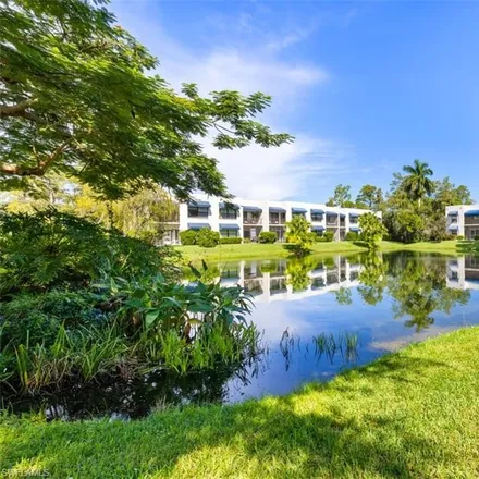 Buy this 2 bed condo on Europa Drive in Collier County, FL 34105