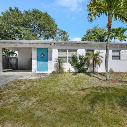 Buy this 3 bed house on 5926 Northeast 6th Terrace in Broward County, FL 33334