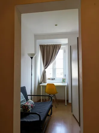 Rent this 6 bed room on Rua do Carrião in 1150-251 Lisbon, Portugal