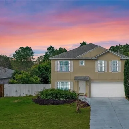 Buy this 4 bed house on 148 Lake Catherine Circle in Groveland, FL 34736