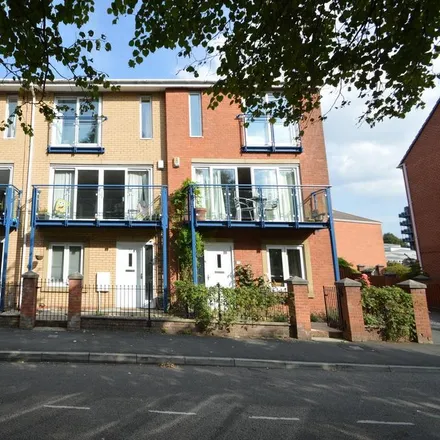 Rent this 4 bed townhouse on 22 The Sanctuary in Manchester, M15 5TR