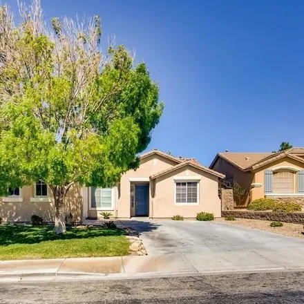 Rent this 4 bed house on 1396 Adagietto Drive in Henderson, NV 89052