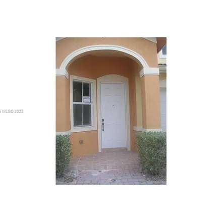 Rent this 3 bed apartment on 27450 Southwest 138th Place in Naranja, Miami-Dade County