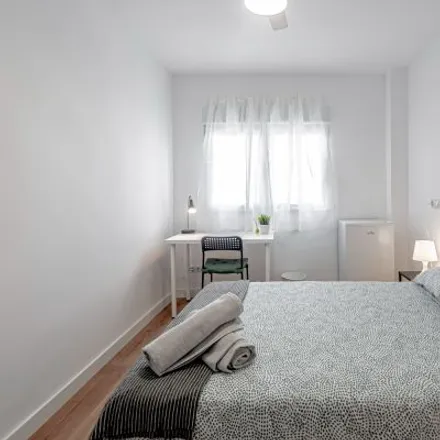 Rent this 2 bed room on Calle de La Pilarica in 25, 28026 Madrid