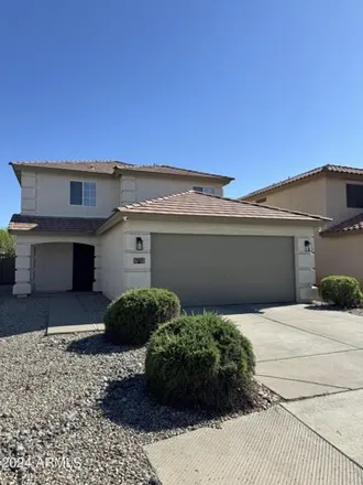 Buy this 4 bed house on 1065 East Desert Holly Drive in San Tan Valley, AZ 85143