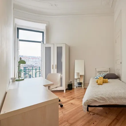 Rent this 7 bed room on Rua Pascoal de Melo 58 in 1000-999 Lisbon, Portugal