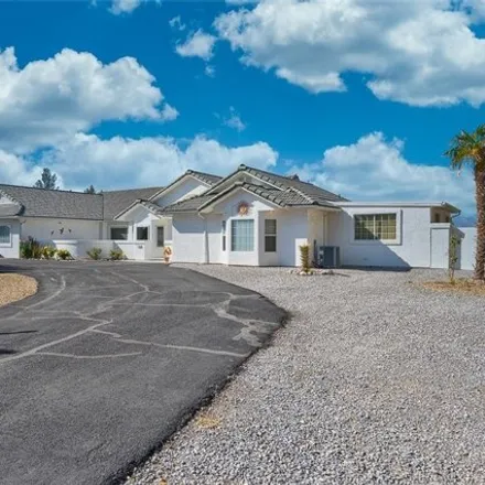 Buy this 3 bed house on 1584 Red Rock Drive in Pahrump, NV 89048