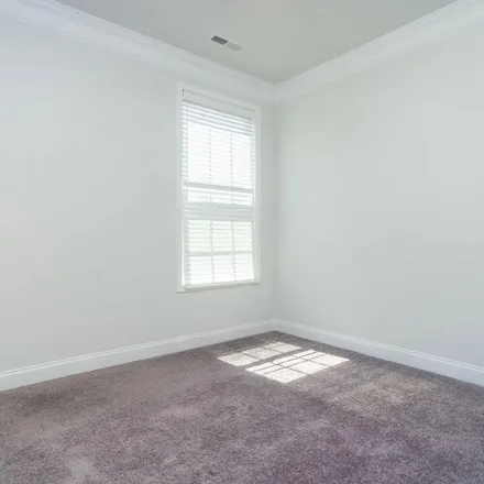 Rent this 4 bed apartment on 7325 Birchshire Drive in Raleigh, NC 27616