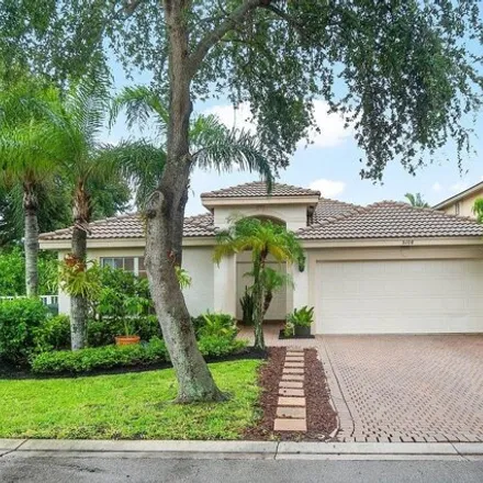 Buy this 3 bed house on 5108 Bright Galaxy Ln in Greenacres, Florida