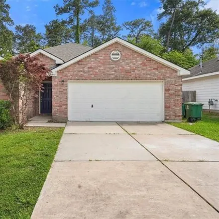 Rent this 3 bed house on 444 Laurel Sage Drive in Houston, TX 77339