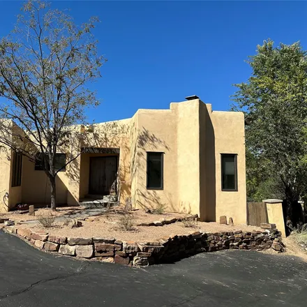 Buy this 4 bed house on 2803 Plaza Verde in Santa Fe, NM 87507