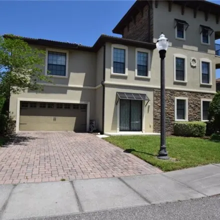 Rent this 5 bed house on 1345 Shinnecock Hills Drive in Four Corners, FL 33896