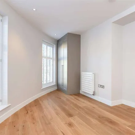 Rent this 3 bed apartment on Tesco Express in 385-387 Upper Richmond Road West, London