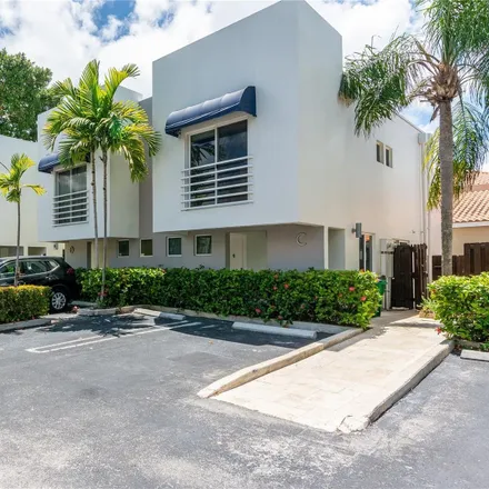 Rent this 2 bed townhouse on 2945 Bridgeport Avenue in South Bay Estates, Miami