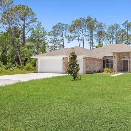 Buy this 4 bed house on 90 Kashmir Trail in Palm Coast, FL 32164