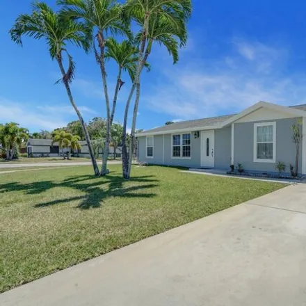 Buy this 2 bed house on 5154 South Saint John Avenue in Palm Beach County, FL 33472