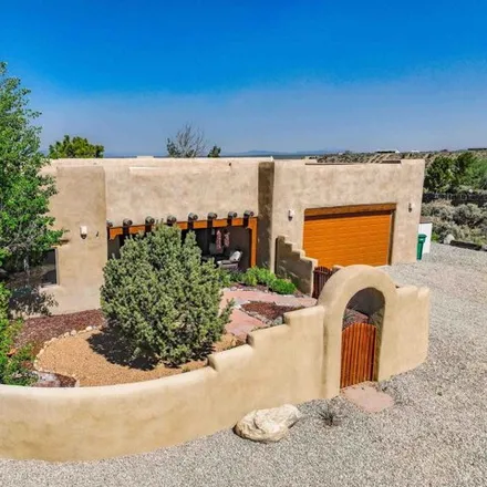 Buy this 3 bed house on Vista del Ocaso Road in Taos County, NM 87557