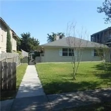 Rent this 2 bed house on 5661 Woodlawn Place in Lakeview, New Orleans