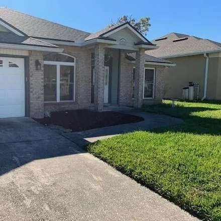 Rent this 4 bed house on 8266 Abbeyfield Drive in Gilmore, Jacksonville