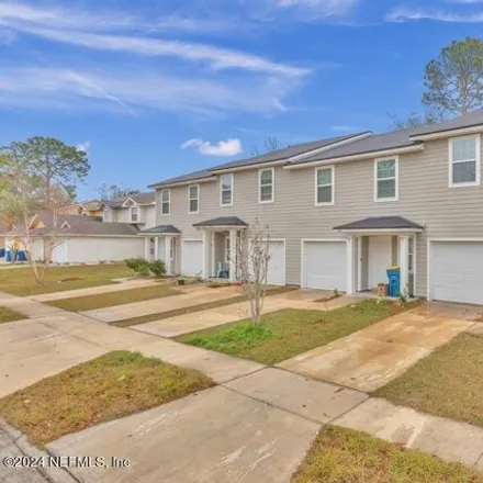 Rent this 3 bed house on 3543 Rain Forest Drive West in Jacksonville, FL 32277