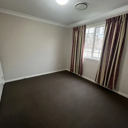 Rent this 3 bed apartment on M5 Cycle Link in Prestons NSW 2170, Australia