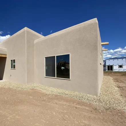 Buy this 3 bed house on 91 Shaman in Santa Fe County, NM 87506