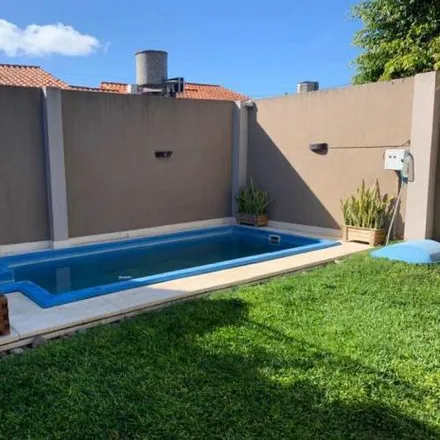 Buy this 4 bed house on Melo 1659 in Partido de Lomas de Zamora, 1828 Banfield