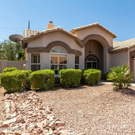 Buy this 4 bed house on 1733 West Commerce Avenue in Gilbert, AZ 85233