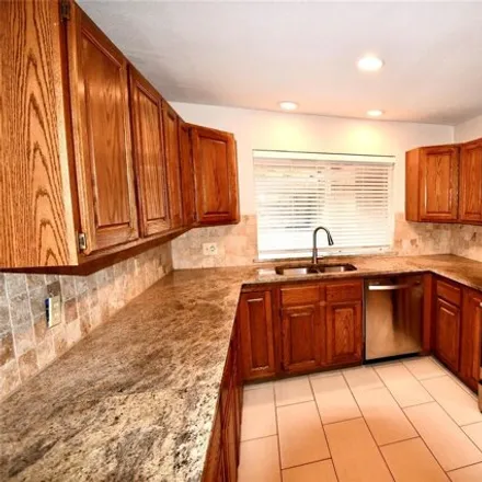 Rent this 4 bed house on 154 East Highland Drive in Irving, TX 75062