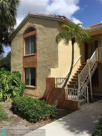 Rent this 2 bed condo on 1069 Coral Club Drive in Coral Springs, FL 33071