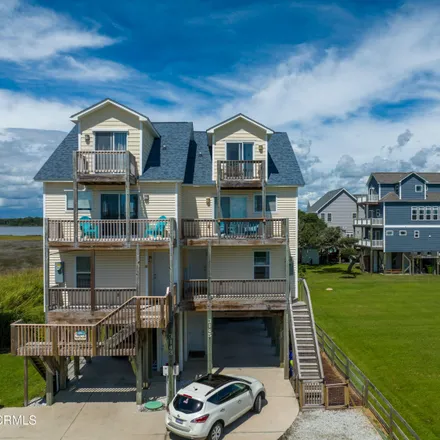 Buy this 3 bed townhouse on 3128 Island Drive in Ocean City Beach, North Topsail Beach