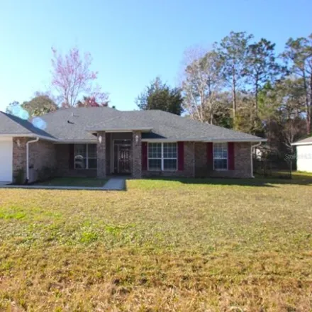 Rent this 4 bed house on 38 Round Table Lane in Palm Coast, FL 32164