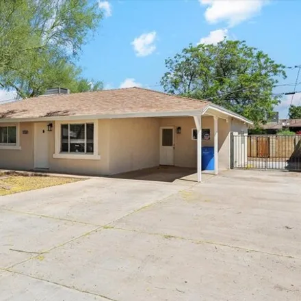 Rent this 4 bed house on 2514 East Meadowbrook Avenue in Phoenix, AZ 85016