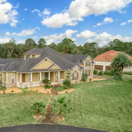 Buy this 6 bed house on 96082 Scarlet Oaks Court in Yulee, FL 32097