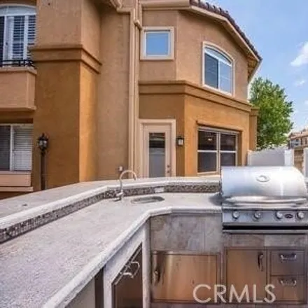 Buy this 4 bed townhouse on 5029 East Tenderrow Place in Orange, CA 92867