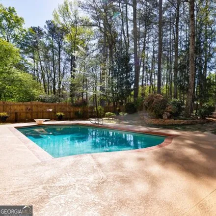 Buy this 4 bed house on 125 Saddlebrook Court in Roswell, GA 30075